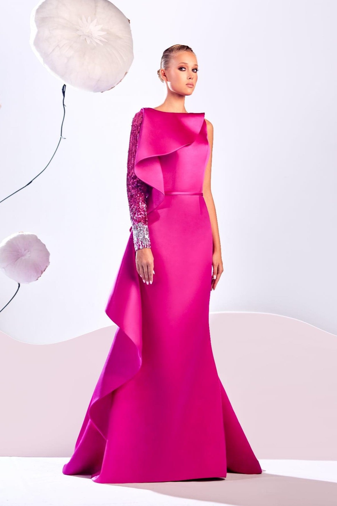 One Embellished Sleeve Gown