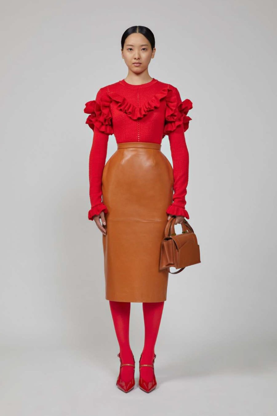 Wool Sweater and Leather Skirt