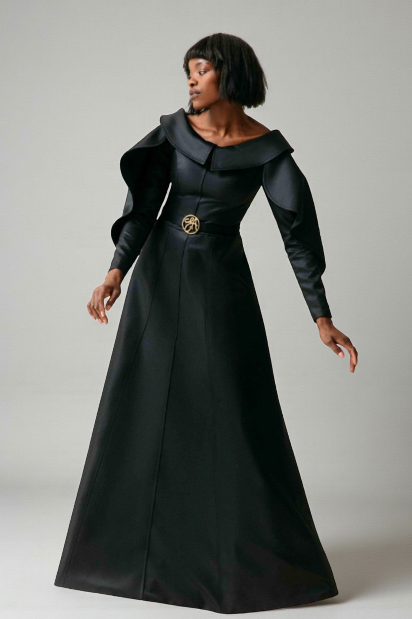 Cape-Like Sleeve Gown